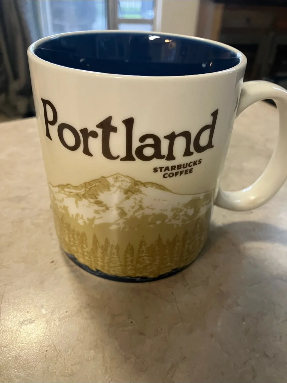 Starbucks White Mug with Green Interior and Green Alaska Lettering